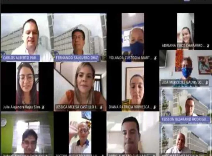 Imagen de computador con personas en reunión 